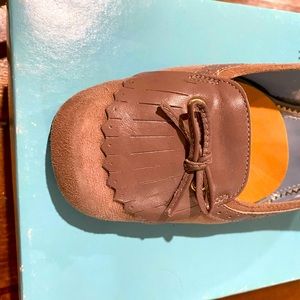 Audrey Brooke tassel loafer-style suede heels.